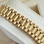 Sunday calendar series men's watch, gold dial, gold bezel, 40mm, gold President-style bracelet.